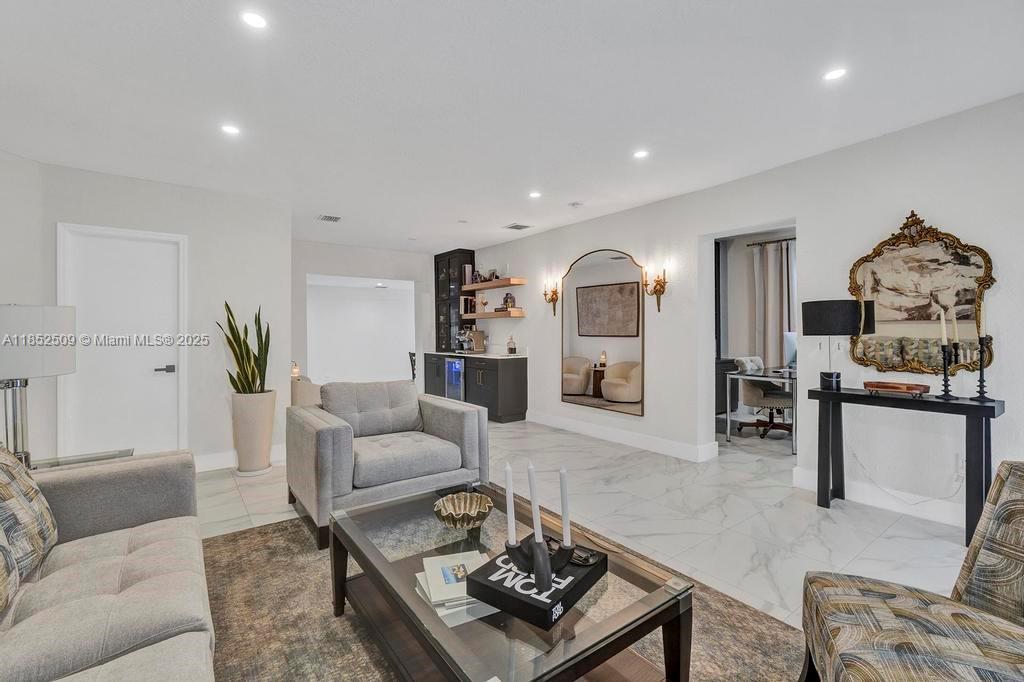 6470 Southwest 27th Street Miami, FL 33155 - Photo 7 of 38 a living room with furniture and wooden floor
