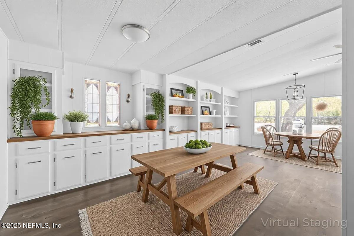 112 Bayberry Road Georgetown, FL 32139 - Photo 13 of 44 a living room with granite countertop furniture a table and chairs in it