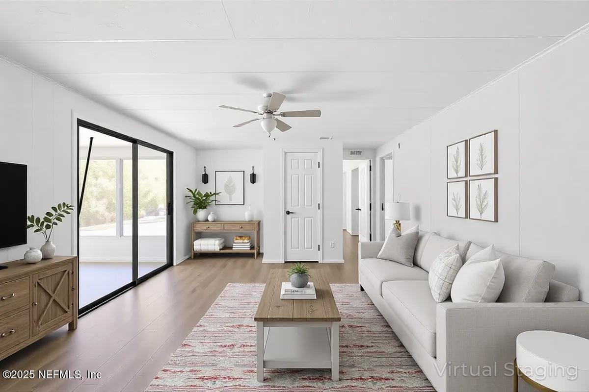 112 Bayberry Road Georgetown, FL 32139 - Photo 21 of 44 a living room with furniture and a large window