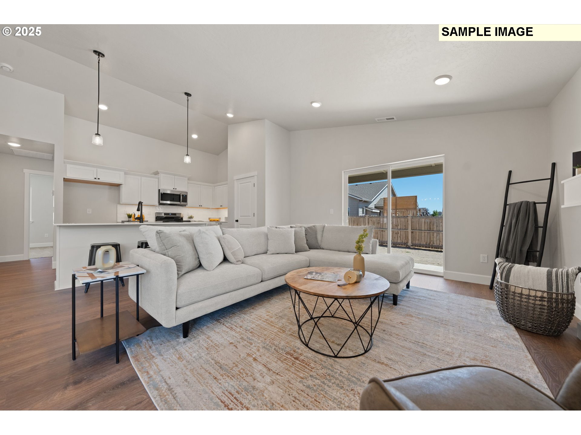 579 Arthur Street Umatilla, OR 97882 - Photo 17 of 31 a living room with furniture and a wooden floor