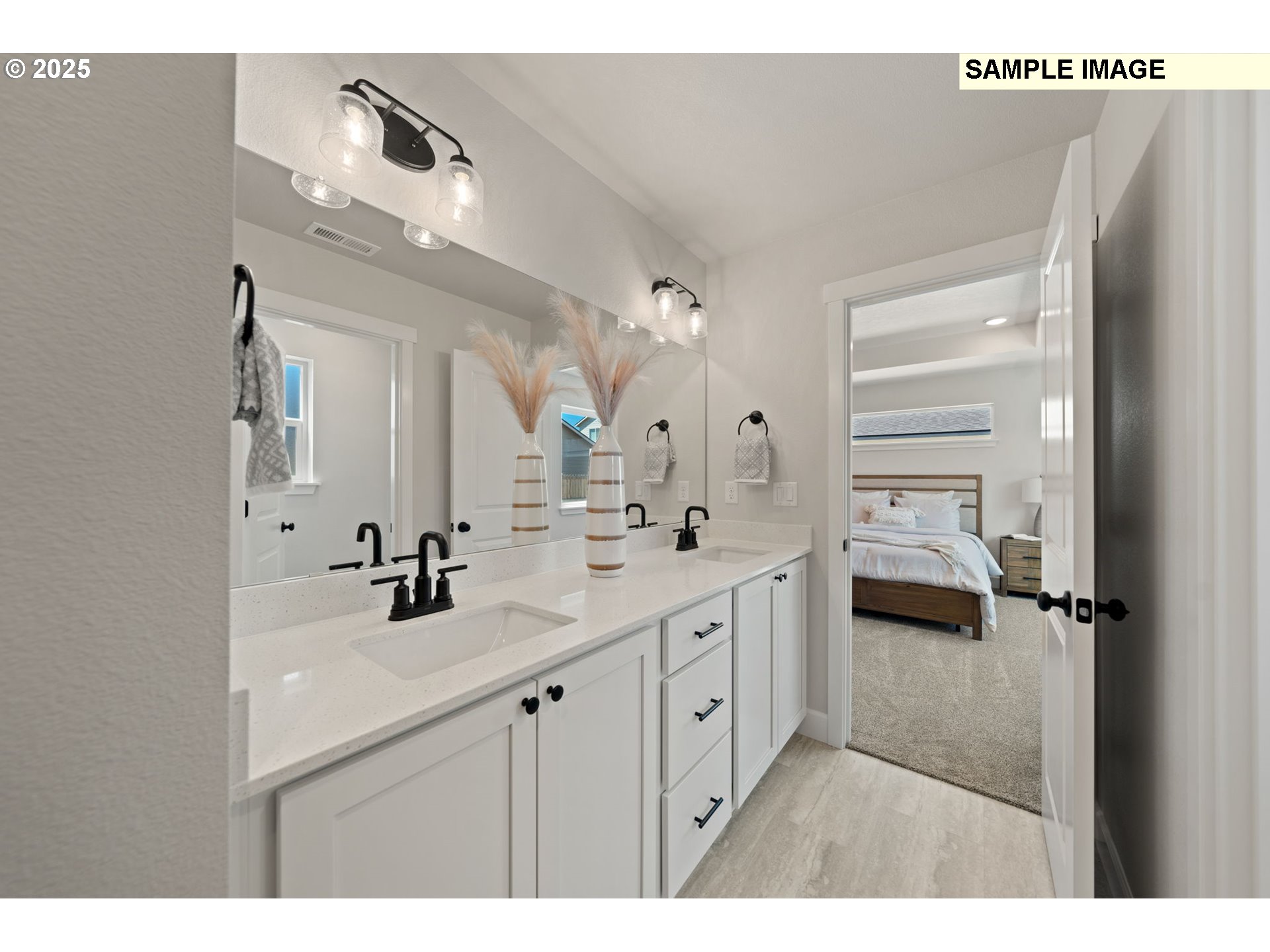 579 Arthur Street Umatilla, OR 97882 - Photo 22 of 31 a bathroom with a sink a mirror and a shower