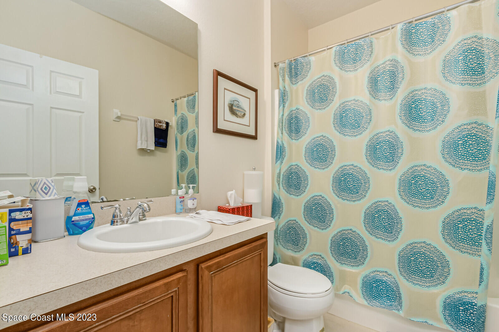 881 Benton Drive Melbourne, FL 32901 - Photo 20 of 34 a bathroom with a sink and a mirror