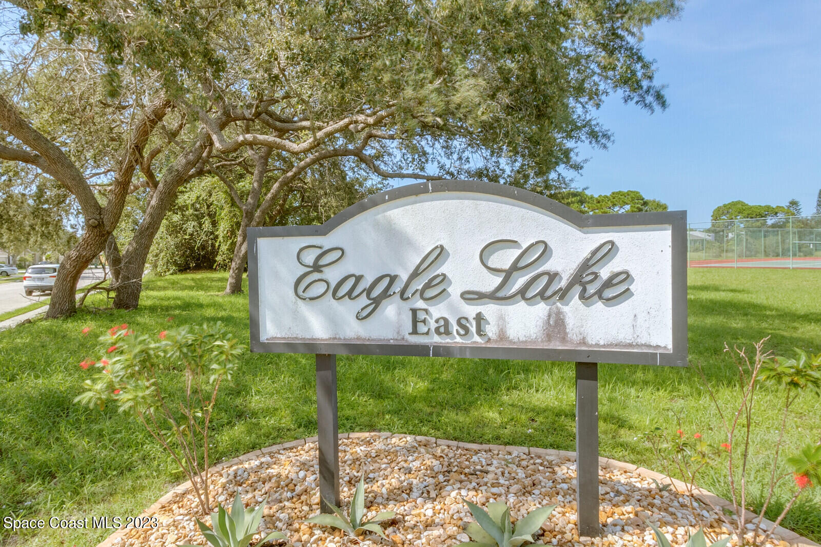 881 Benton Drive Melbourne, FL 32901 - Photo 34 of 34 a sign broad on the side of the road