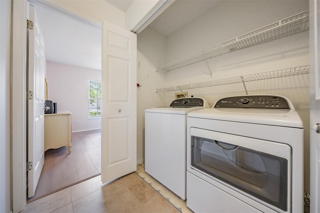 4504 Connery Court Palm Harbor, FL 34685 - Photo 20 of 33 a utility room with dryer and washer