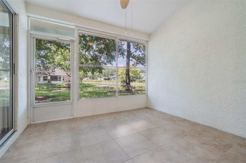 4504 Connery Court Palm Harbor, FL 34685 - Photo 22 of 33 an empty room with windows