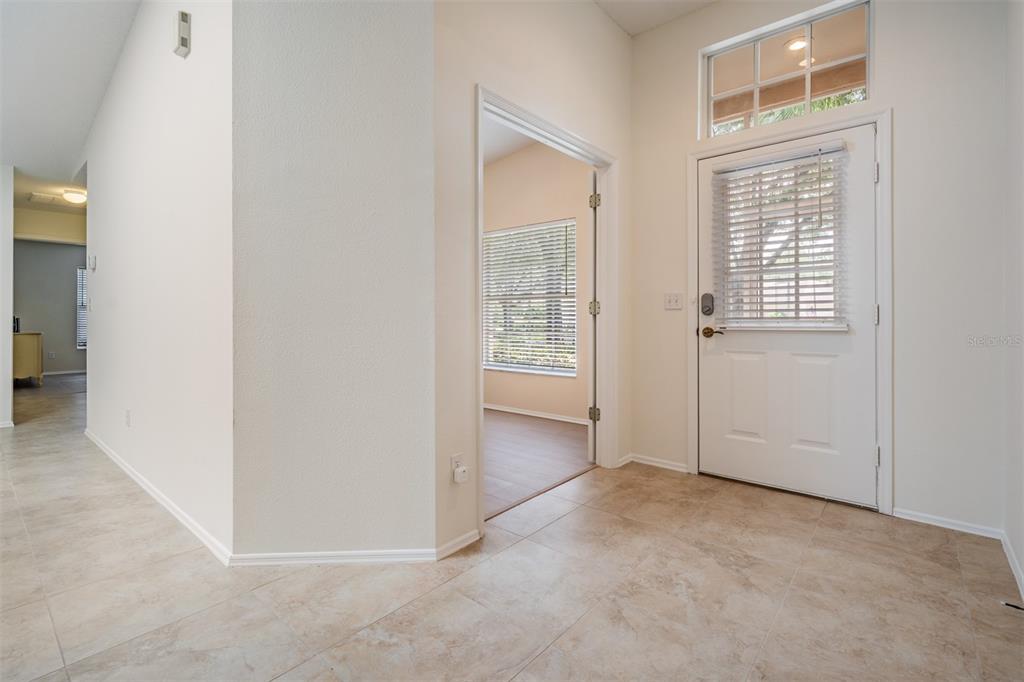 4504 Connery Court Palm Harbor, FL 34685 - Photo 4 of 33 a view of an empty room with a window