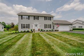 7 Valley Court Florida, NY 10921 - Photo 1 of 30 a front view of a house with a yard