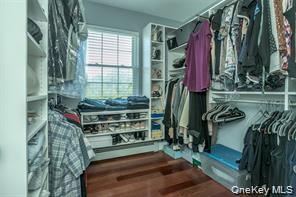 7 Valley Court Florida, NY 10921 - Photo 17 of 30 a view of walk in closet with clothes