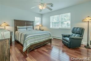 7 Valley Court Florida, NY 10921 - Photo 18 of 30 a bedroom with a bed couch and a window