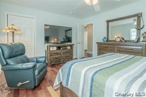 7 Valley Court Florida, NY 10921 - Photo 19 of 30 a bedroom with a bed and a couch