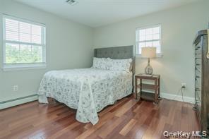 7 Valley Court Florida, NY 10921 - Photo 20 of 30 a bedroom with a bed and a table