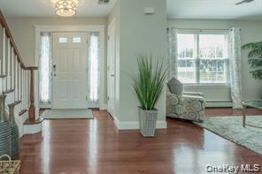 7 Valley Court Florida, NY 10921 - Photo 2 of 30 a view of hallway with window and wooden floor