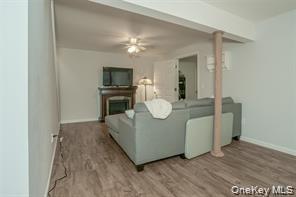 7 Valley Court Florida, NY 10921 - Photo 23 of 30 a living room with furniture and a flat screen tv