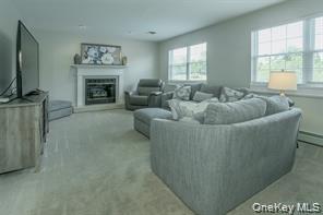 7 Valley Court Florida, NY 10921 - Photo 10 of 30 a living room with furniture and a fireplace