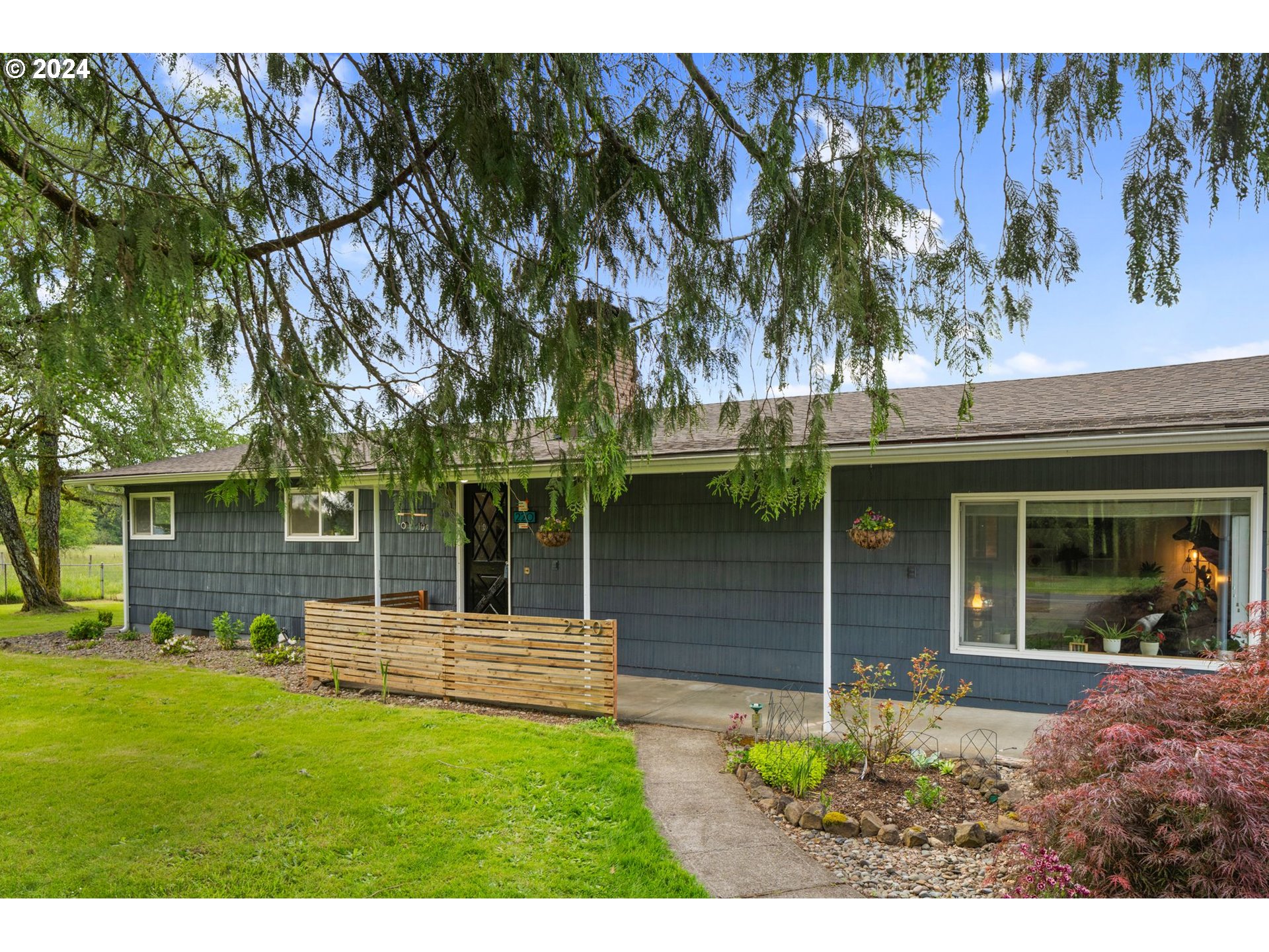 220 Drews Prairie Road Toledo, WA 98591 - Photo 2 of 33 a backyard of a house with seating space