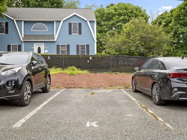 a car parked in front of a house