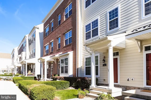 a view of a building with a yard
