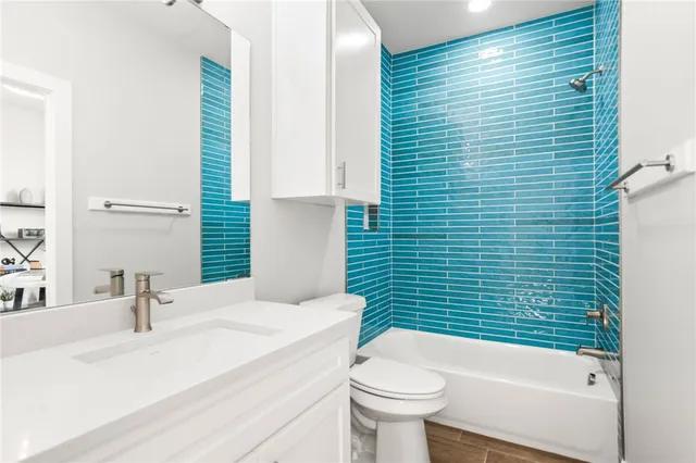 a bedroom with a bed and a walk in closet