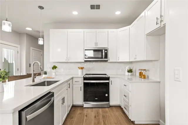 a view of a dining room with furniture