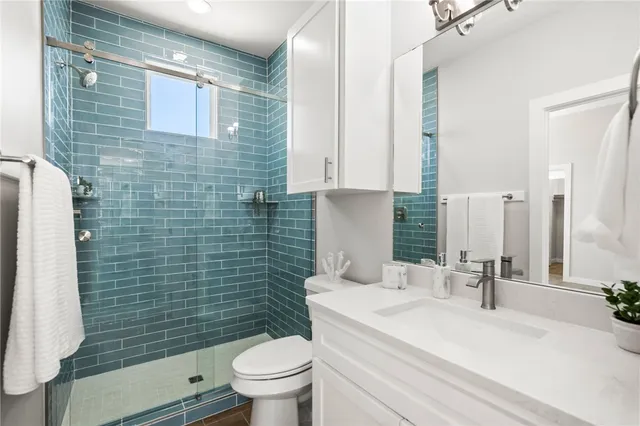 a view of balcony with wooden floor and fence