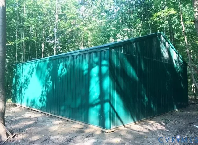 a view of backyard with green space