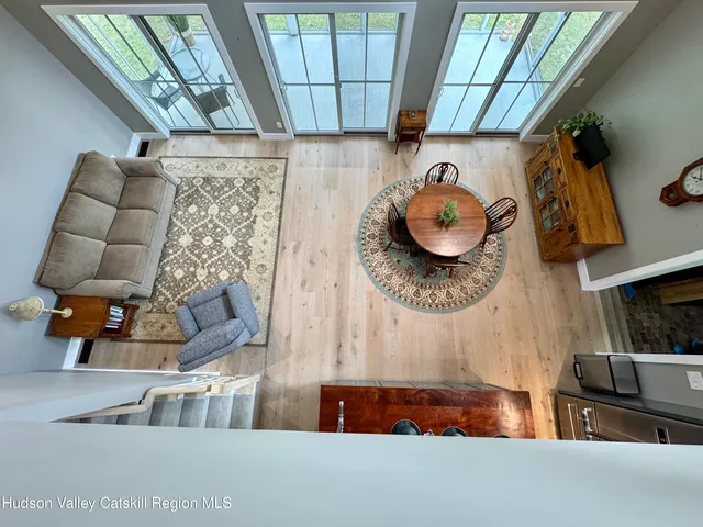 a view of a hallway with washer and dryer