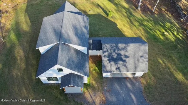 a view of a house with a mountain