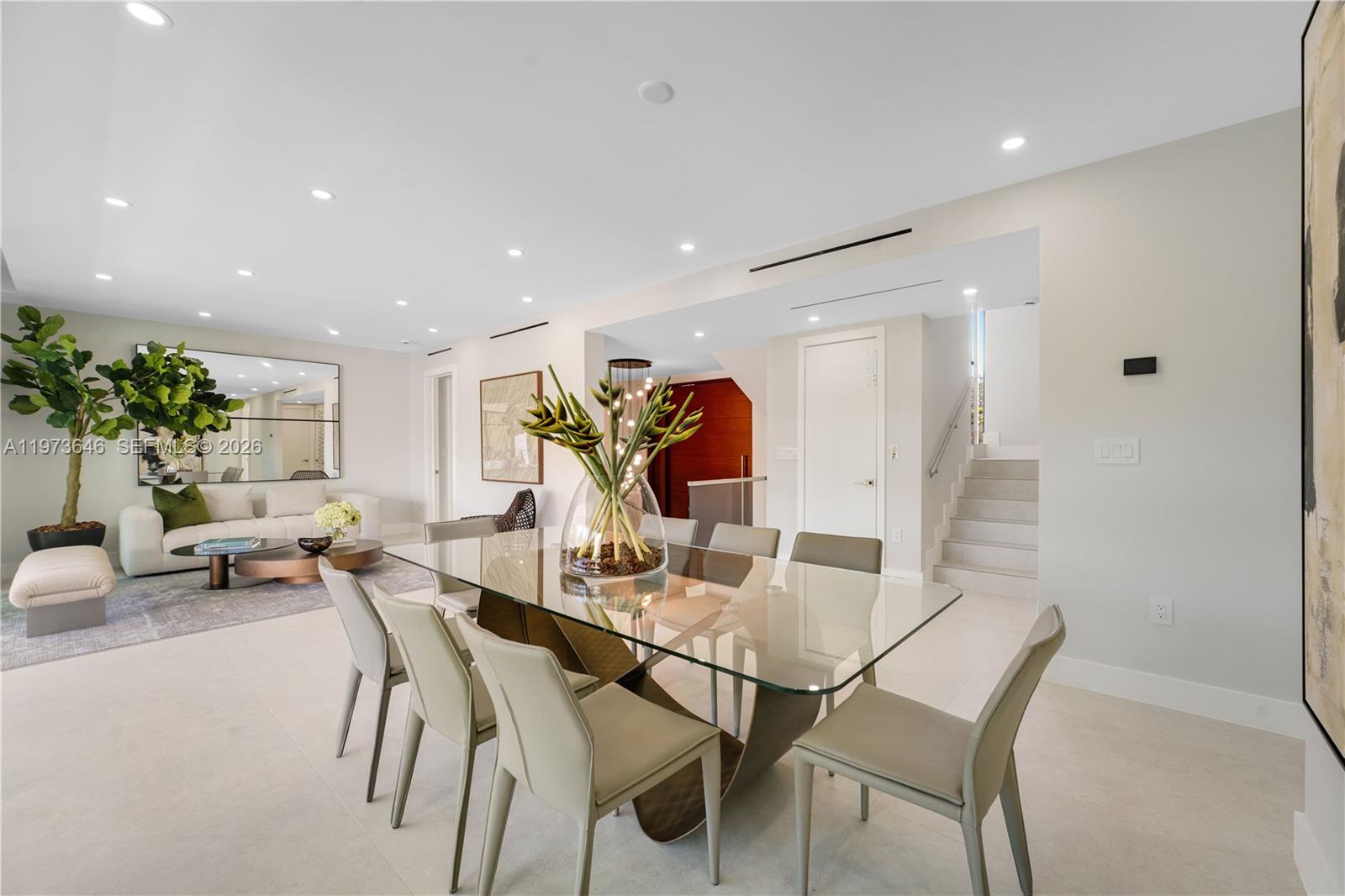 285 Woodcrest Road Key Biscayne, FL 33149 - Photo 16 of 53 a view of a dining room with furniture