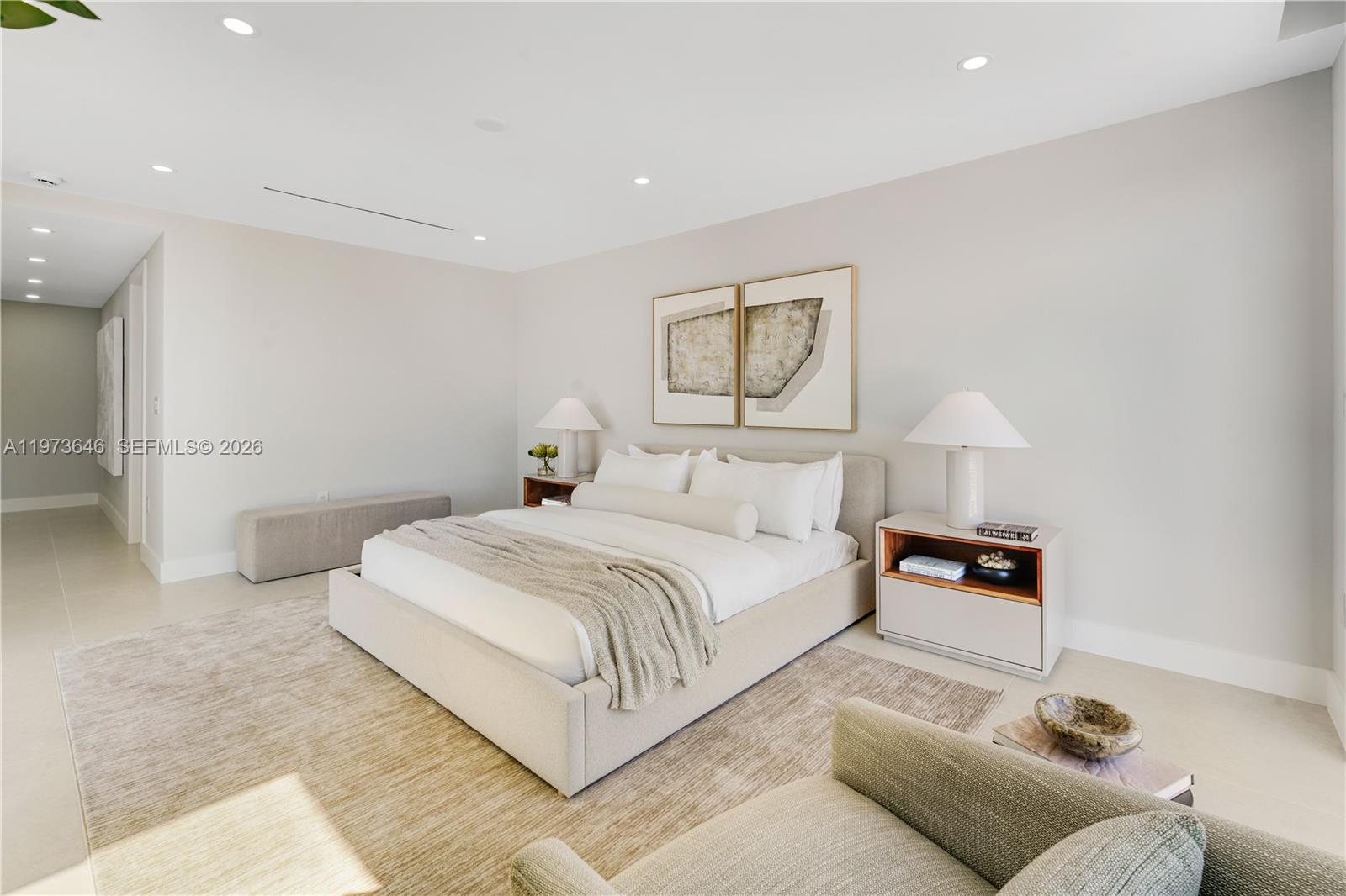 285 Woodcrest Road Key Biscayne, FL 33149 - Photo 26 of 53 a bedroom with a bed and a lamp