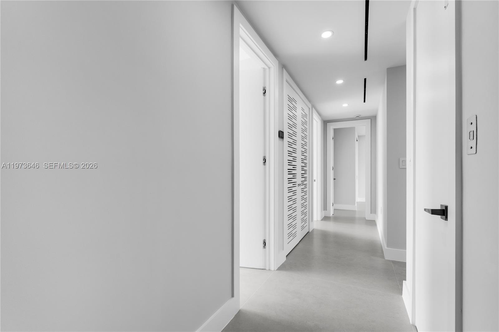285 Woodcrest Road Key Biscayne, FL 33149 - Photo 29 of 53 a view of a hallway with closet