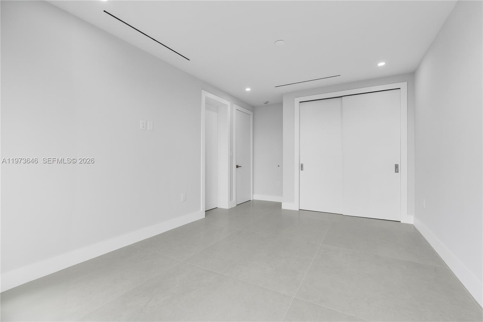 285 Woodcrest Road Key Biscayne, FL 33149 - Photo 30 of 53 a view of an empty room