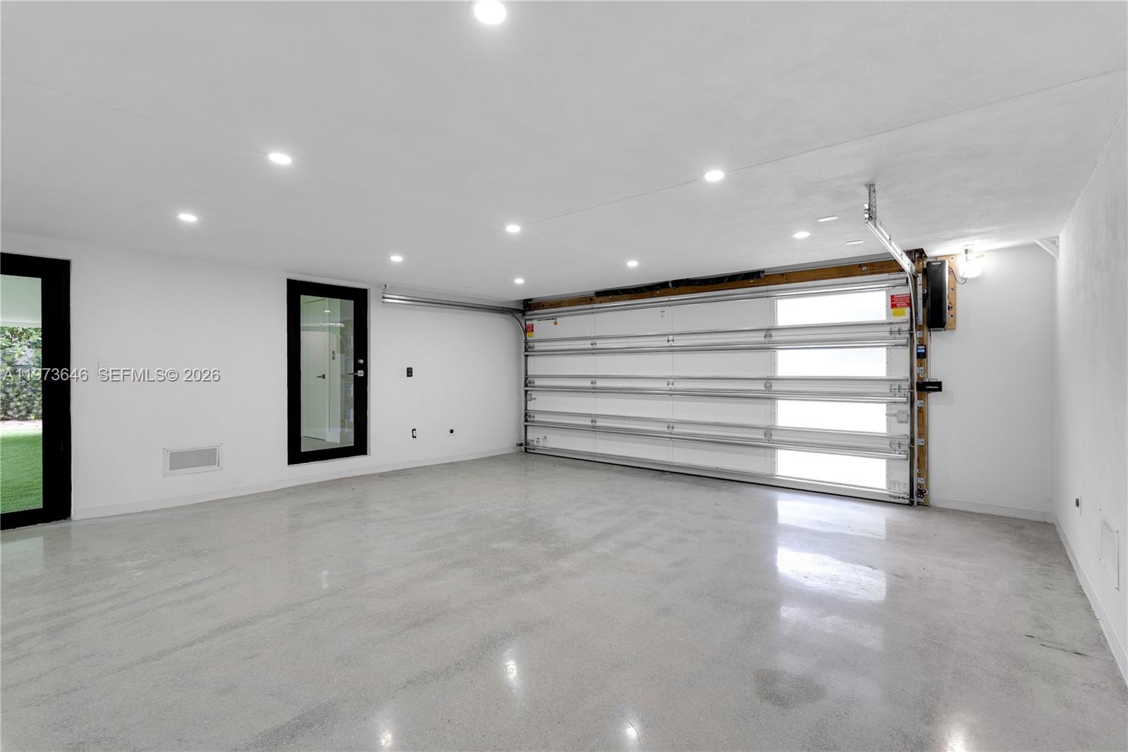 285 Woodcrest Road Key Biscayne, FL 33149 - Photo 47 of 53 a view of an empty room with a window