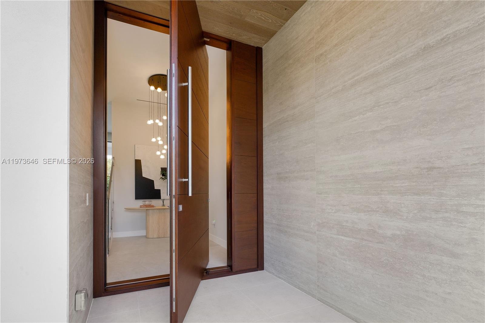 285 Woodcrest Road Key Biscayne, FL 33149 - Photo 9 of 53 a bathroom with a shower