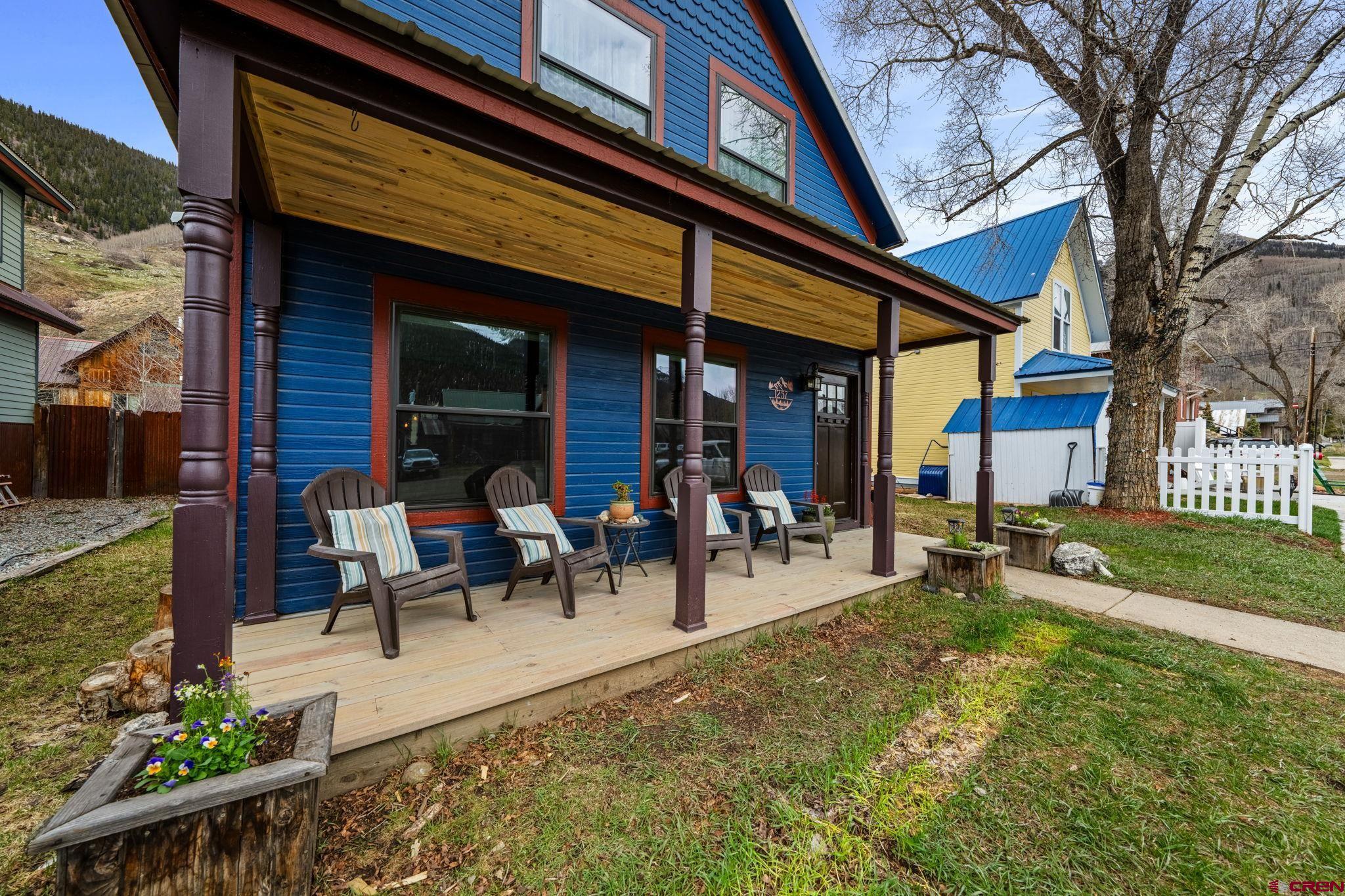 1257 Snowden Street Silverton, CO 81433 - Photo 2 of 29 a view of a dinning tables and chairs in patio of the house