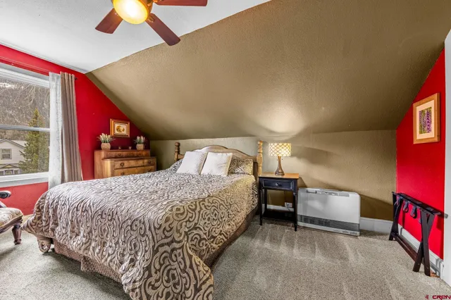 a view of a living room and bathroom