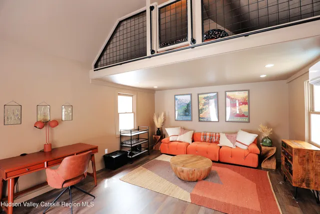 a bedroom with furniture and a couch