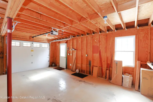 a view of a room with large windows