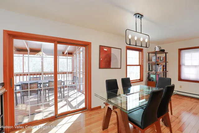 a view of a dining room with furniture window and outside view