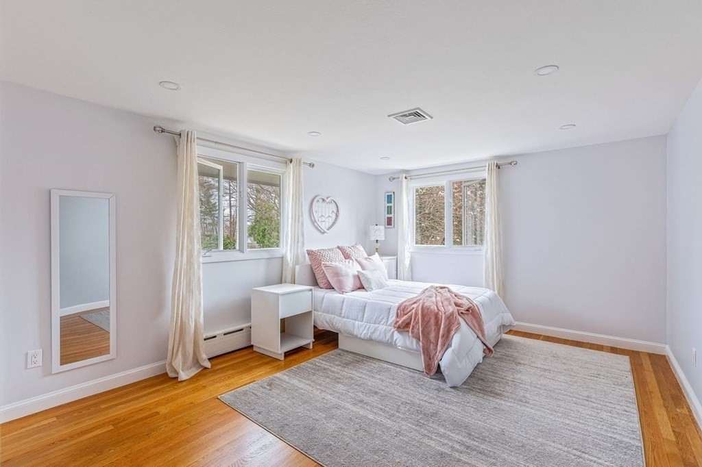 56 James Road Hanover, MA 02339 - Photo 13 of 31 a room with two bed and a window