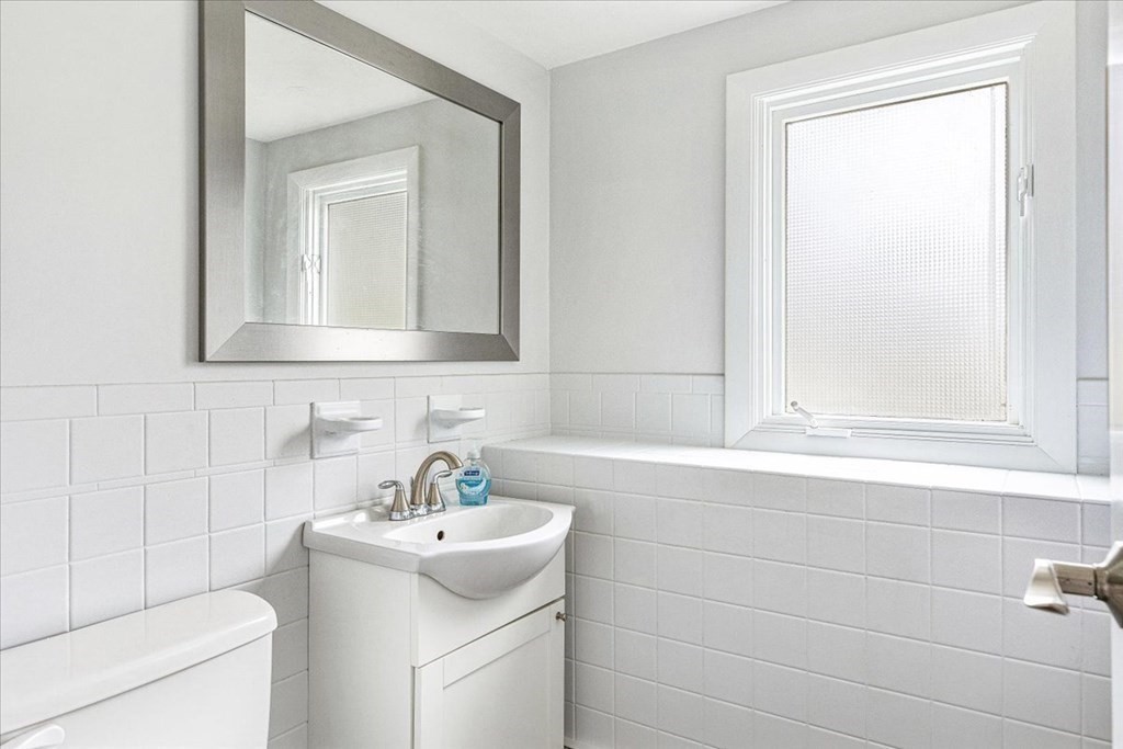 56 James Road Hanover, MA 02339 - Photo 19 of 31 a bathroom with a sink toilet and mirror