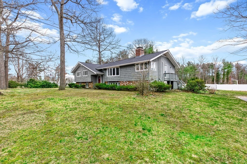 56 James Road Hanover, MA 02339 - Photo 26 of 31 a view of a house with yard and a garden