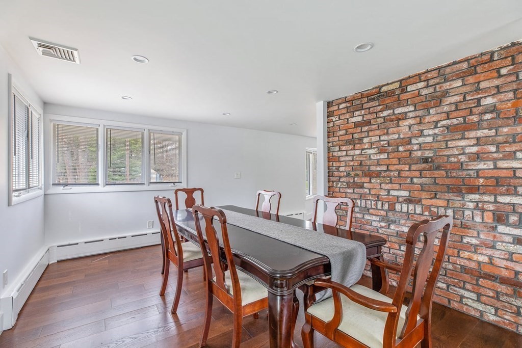 56 James Road Hanover, MA 02339 - Photo 8 of 31 a view of a dining room with furniture and a large window