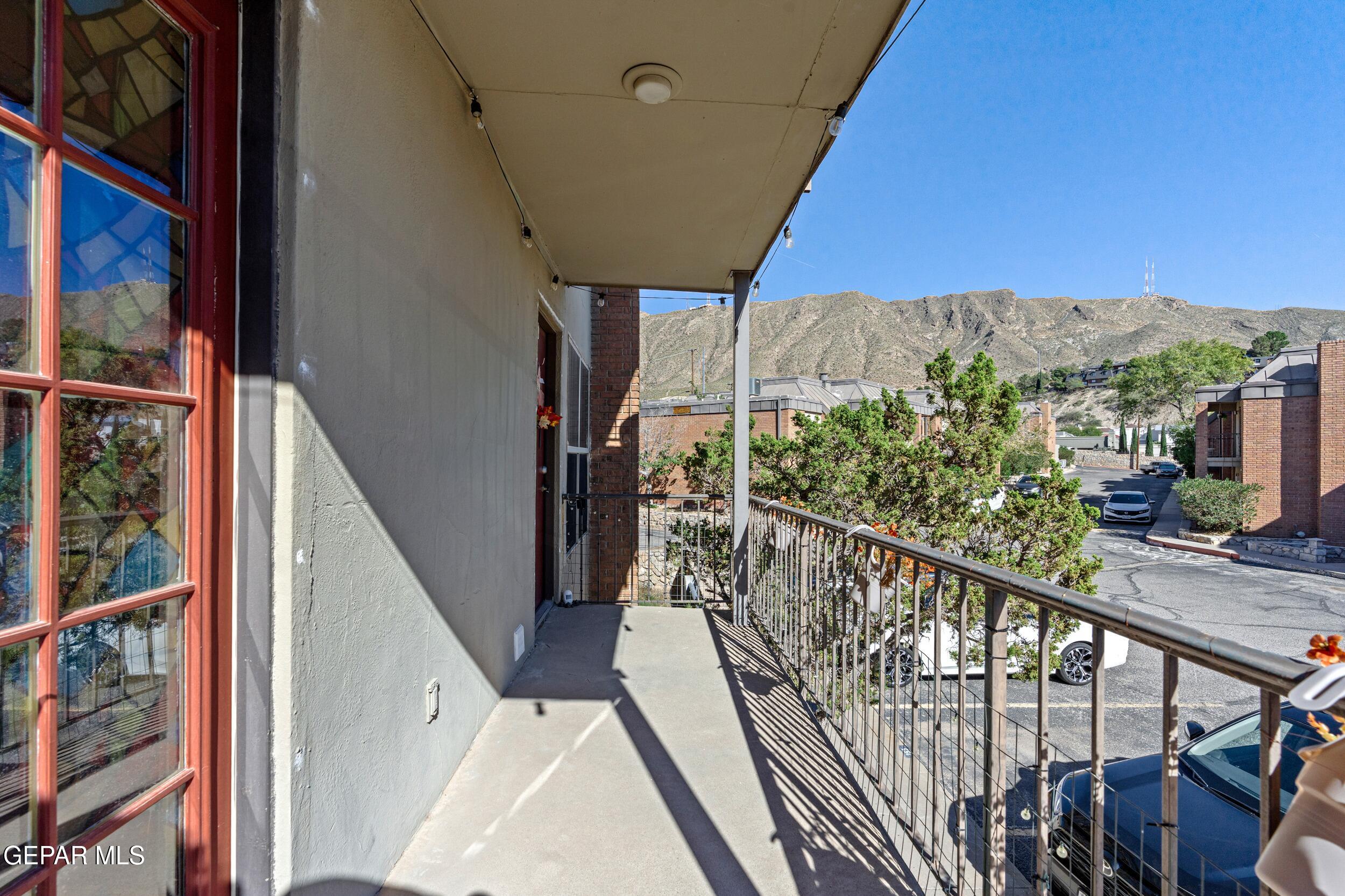 4433 North Stanton Street, Unit P358 El Paso, TX 79912 - Photo 16 of 19 a view of a balcony with furniture