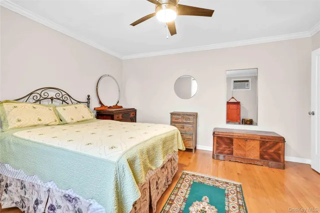 wooden floor with table and chairs