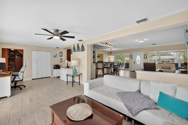 a bed room with a bed and a chandelier