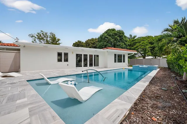 a view of a chairs and table on the terrace