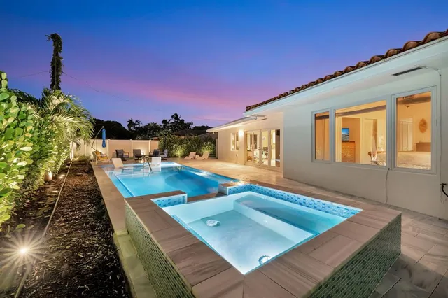 a view of a back yard of the house