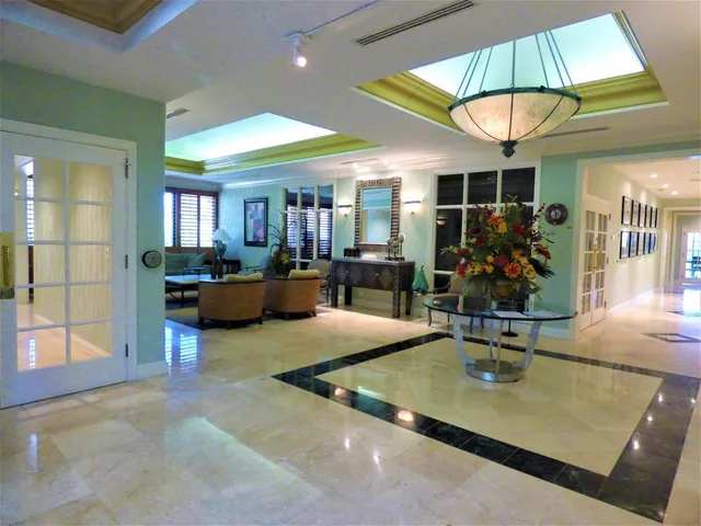 a view of a livingroom with furniture and window