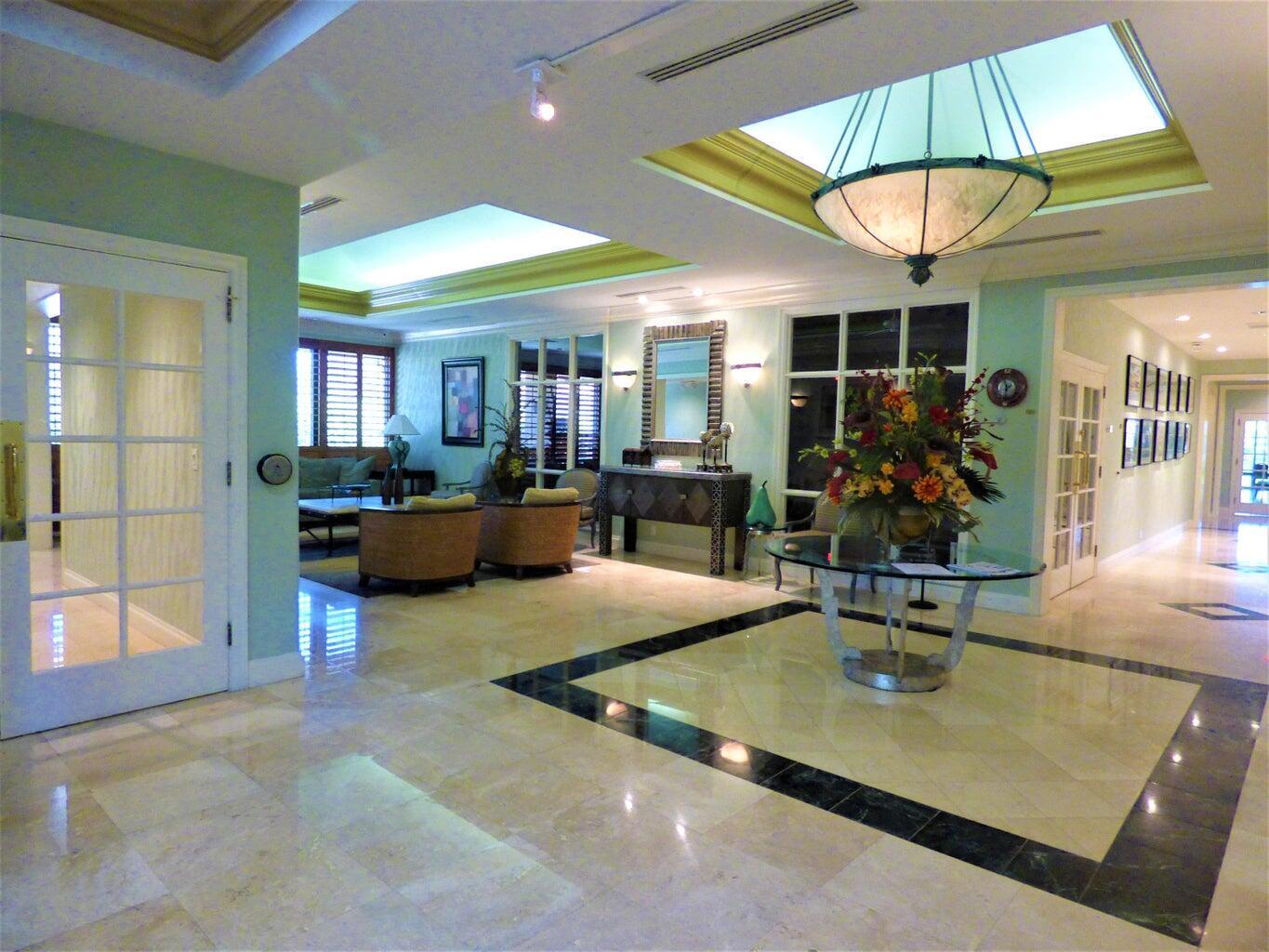 2686 Northwest 7th Court, Unit C Delray Beach, FL 33445 - Photo 17 of 33 a view of a livingroom with furniture and window