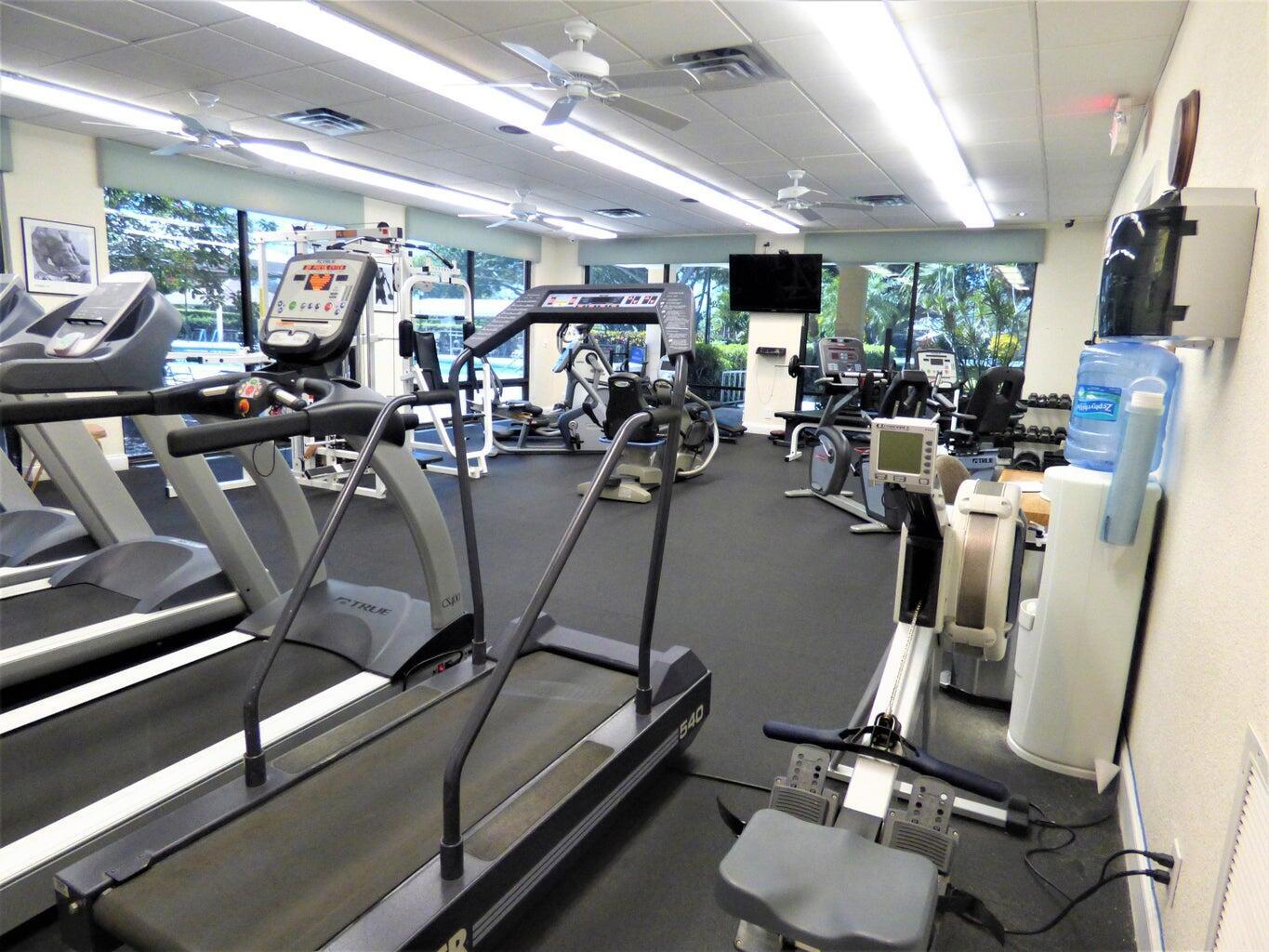 2686 Northwest 7th Court, Unit C Delray Beach, FL 33445 - Photo 20 of 33 a view of a room with gym equipment